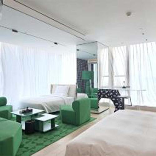 Postel nebo postele na pokoji v ubytování Yashan Tianlai S Hotel (Taikoo Li Chengdu Branch)
