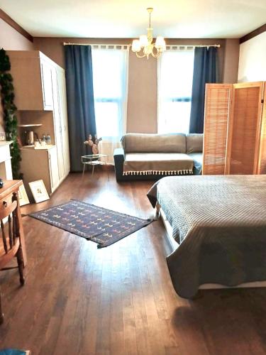 Ένα ή περισσότερα κρεβάτια σε δωμάτιο στο Loka Suites