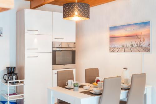 Kuchyň nebo kuchyňský kout v ubytování Apartment Deichglück