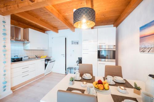 Kuchyň nebo kuchyňský kout v ubytování Apartment Deichglück