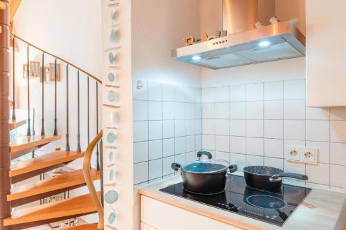 Η κουζίνα ή μικρή κουζίνα στο Apartment Deichglück