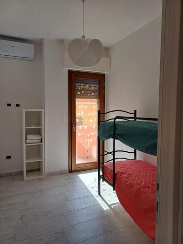 Katil atau katil-katil dalam bilik di Dimora Mediterranea Portopaglia