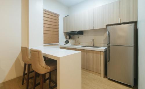 Dapur atau dapur kecil di Elyseah Condotel by RedDoorz