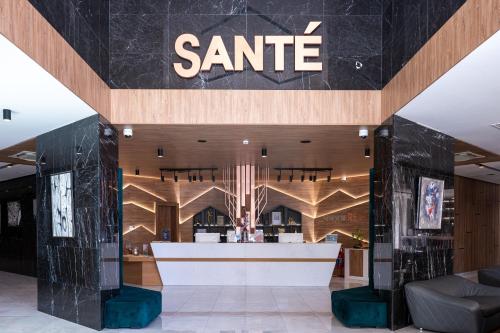 a santee store with a sign on the wall at Santé SPA Hotel in Velingrad