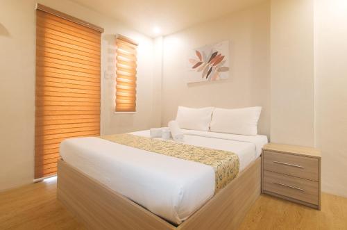 Katil atau katil-katil dalam bilik di Elyseah Condotel by RedDoorz