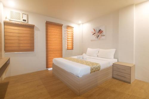 Katil atau katil-katil dalam bilik di Elyseah Condotel by RedDoorz