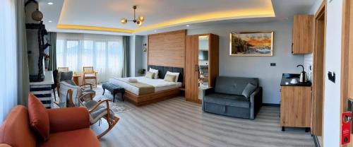 Кровать или кровати в номере Galata Greenland Hotel