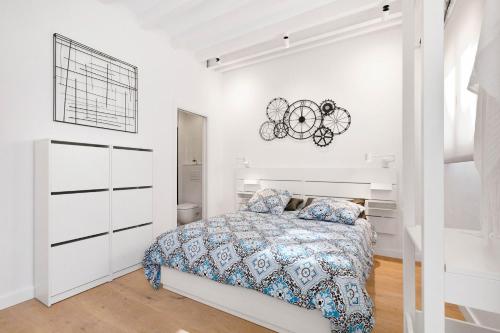 En eller flere senge i et værelse på Apartamento Can Petit