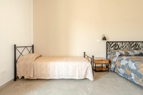 Katil atau katil-katil dalam bilik di Masseria San Biagio