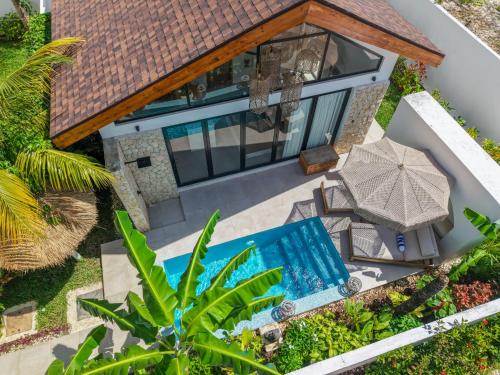 an aerial view of a villa with a swimming pool at Paje Emerald Escapes in Paje