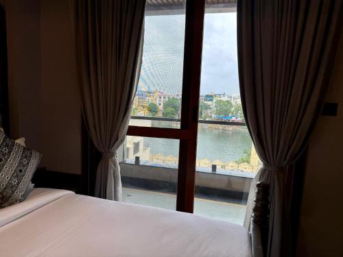 Letto o letti in una camera di The Luxury Tiger at Lake Pichola