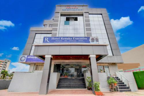 a building with a sign on the front of it at Collection O Chakan MIDC Pune in Pune
