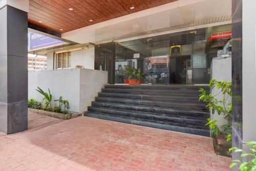 a building with stairs in front of a building at Collection O Chakan MIDC Pune in Pune