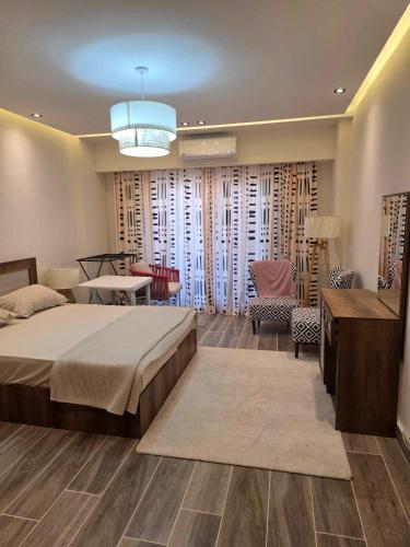 Ένα ή περισσότερα κρεβάτια σε δωμάτιο στο Apartment at El Down Town New El Alamein