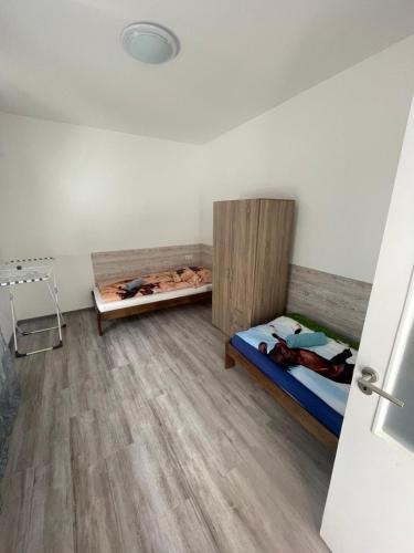 Katil atau katil-katil dalam bilik di Bem apartmanok Kecskemét