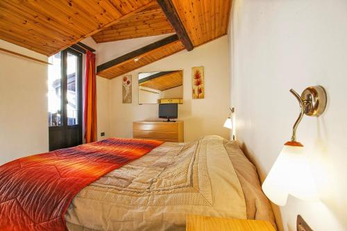 Ένα ή περισσότερα κρεβάτια σε δωμάτιο στο Bilocale Pieggio