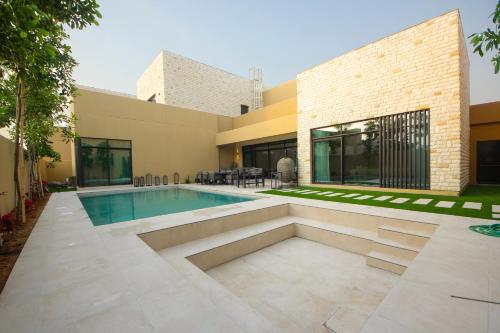 Silk Valley - Al Jurf Luxury 4BR with private pool and steps away from Beach