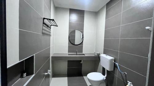 Ένα μπάνιο στο Taman Tanjung Minyak 75250