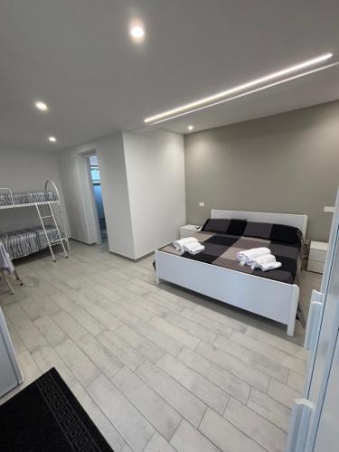 Кровать или кровати в номере B&B Villa Antonella