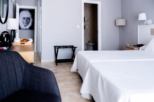 Postel nebo postele na pokoji v ubytování Hotel Puerta del Mar - Adults Recommended