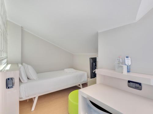 Postel nebo postele na pokoji v ubytování B&B Hotel Bergamo City