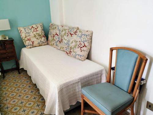 Postel nebo postele na pokoji v ubytování Hotel La Scogliera
