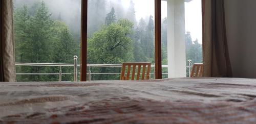Balkón nebo terasa v ubytování Soyal Orchard Retreat- Vanvaas