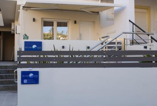 a building with stairs in front of a building at Sidonia Suite in Psari Forada