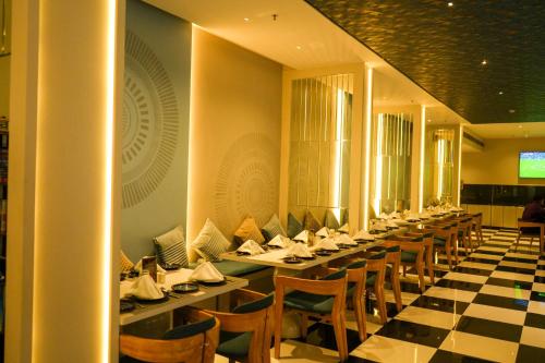 Un restaurante o sitio para comer en Ramee Techome