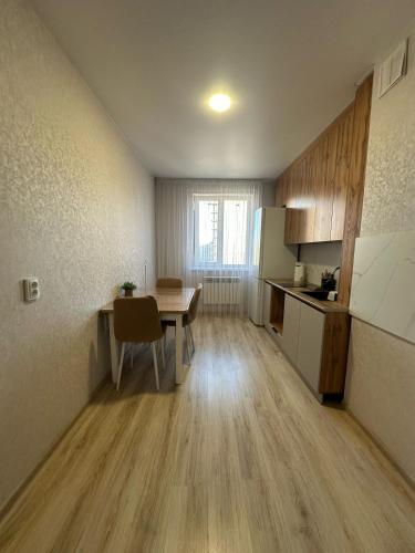 Køkken eller tekøkken på Apartment on Satpayeva