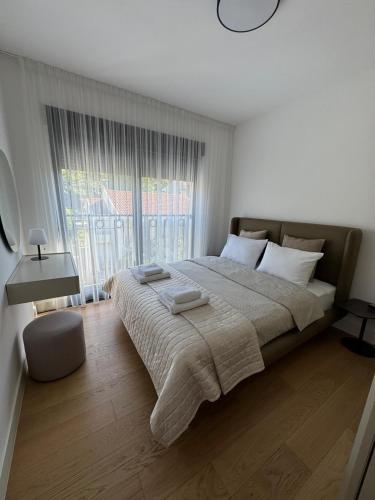 Ένα ή περισσότερα κρεβάτια σε δωμάτιο στο Apartment