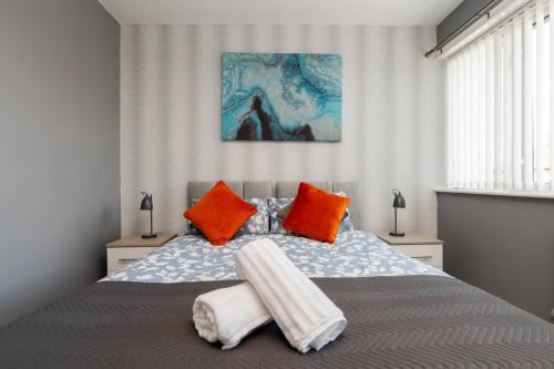 Ένα ή περισσότερα κρεβάτια σε δωμάτιο στο Group Stay Sleeps 8 Speke