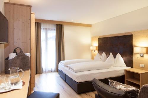 Postel nebo postele na pokoji v ubytování Hotel Stefanshof