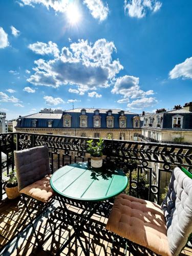 Paris rooftop retreat with sunny balcony