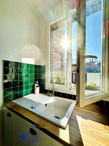 Paris rooftop retreat with sunny balcony