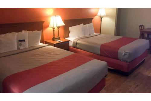 Ein Bett oder Betten in einem Zimmer der Unterkunft Motel 6 Baltimore MD