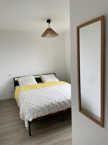 Ein Bett oder Betten in einem Zimmer der Unterkunft Bienvenue au petit point de vue