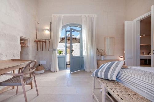 Ένα ή περισσότερα κρεβάτια σε δωμάτιο στο Villa Presta