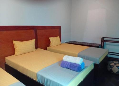 Ein Bett oder Betten in einem Zimmer der Unterkunft Hostel Charm
