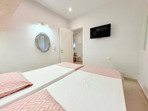 Ένα ή περισσότερα κρεβάτια σε δωμάτιο στο M&N Apartments