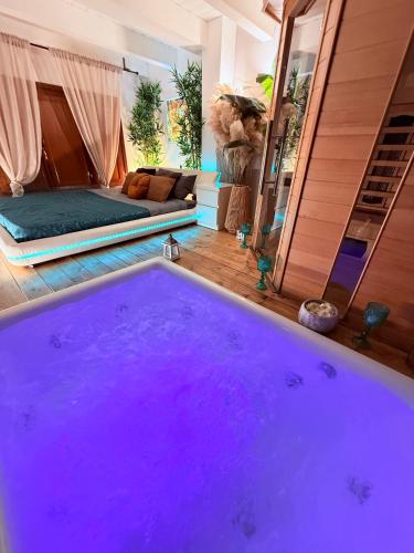 a large purple bath tub in a room at AMA Esclusive SPA Bologna in Bologna
