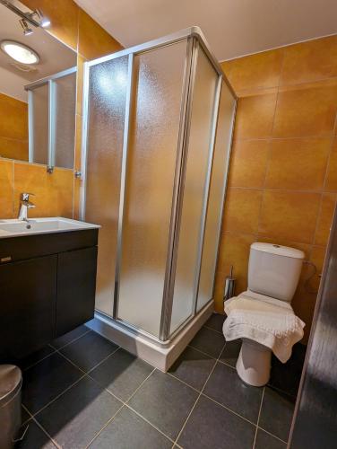 Ein Badezimmer in der Unterkunft Hotel Antoň