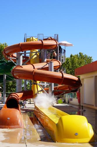 a roller coaster ride in a theme park at Ukino Palmeiras Village - 24h All Inclusive in Armação de Pêra