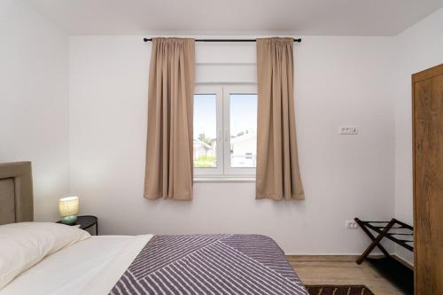 Katil atau katil-katil dalam bilik di Apartment Ledi Neu Vir