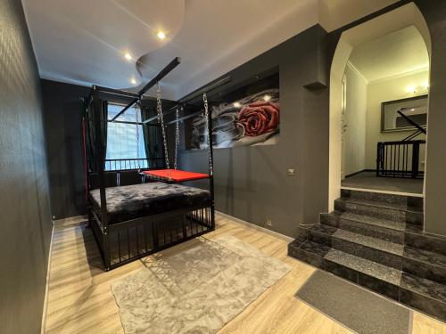 a room with a staircase and a stair case at BDSM accommodation Tallinn, Private Luxury Romance Studio Apartment Tallinn Old Town adults only in Tallinn