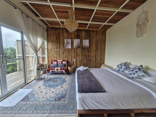 Postel nebo postele na pokoji v ubytování พอยื้อใจ doichang
