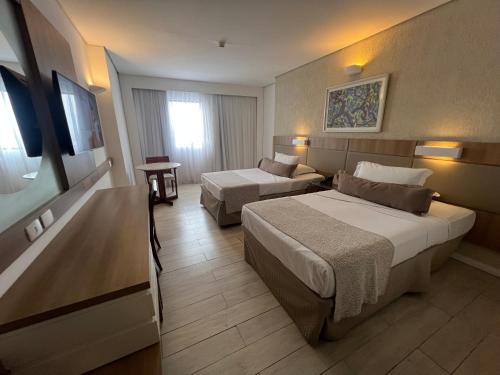 Postel nebo postele na pokoji v ubytování Mar Hotel Conventions