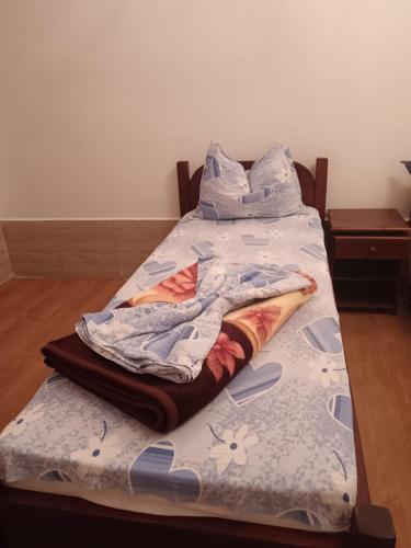 En eller flere senge i et værelse på Apartament Andrada