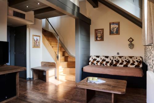 Χώρος καθιστικού στο La Maison Rouge
