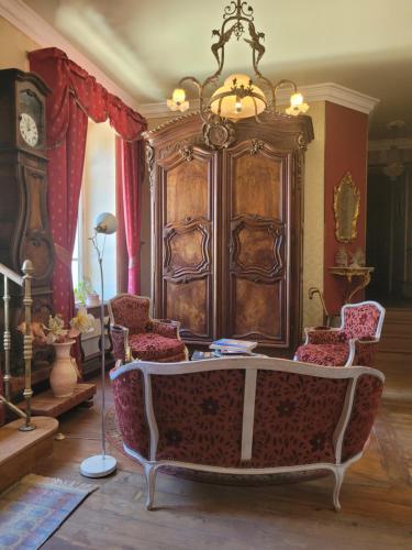 Χώρος καθιστικού στο Château St Sulpice Chambre Pampilles